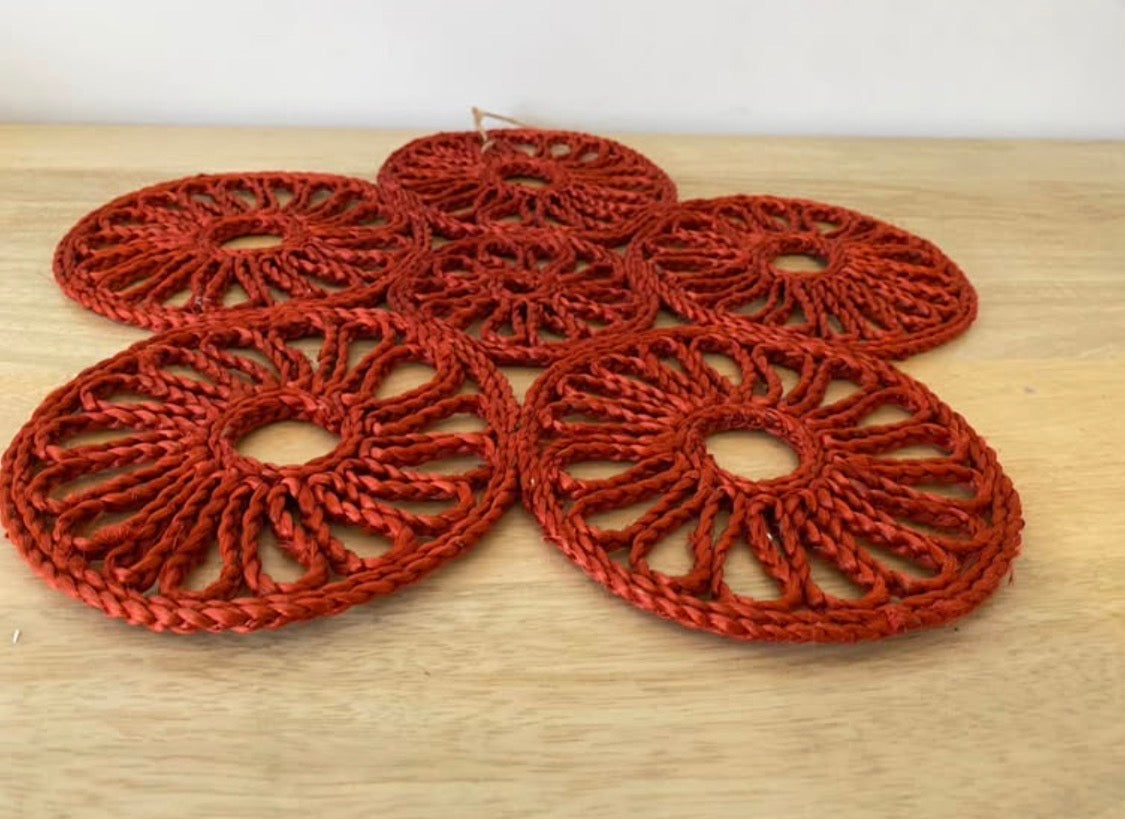 Handmade natural jute centre mat in burnt red colour - 40 cm diameter