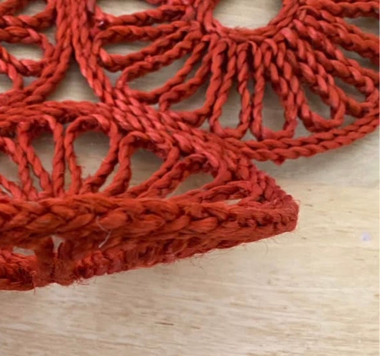 Handmade natural jute centre mat in burnt red colour - 40 cm diameter